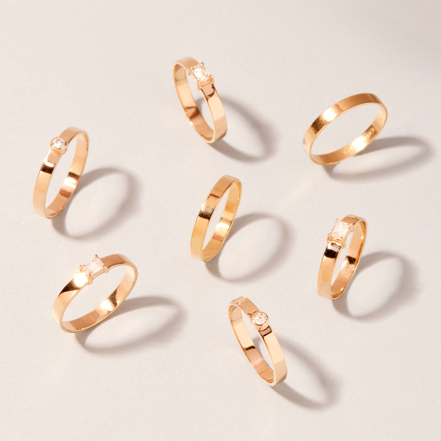 1150-emerald-cut-diamond-tomboy-ring–1.jpg