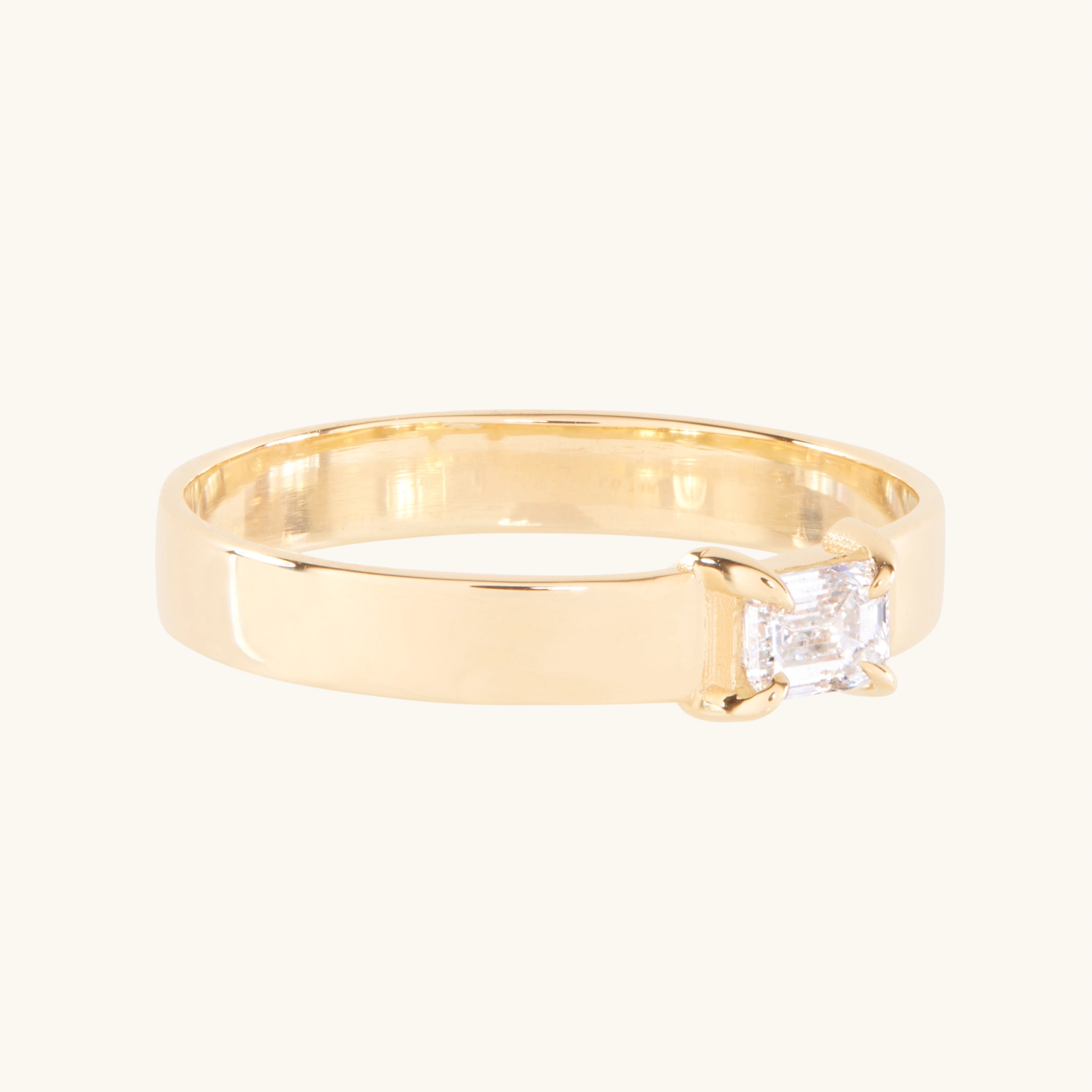 1150-emerald-cut-diamond-tomboy-ring–1.jpg