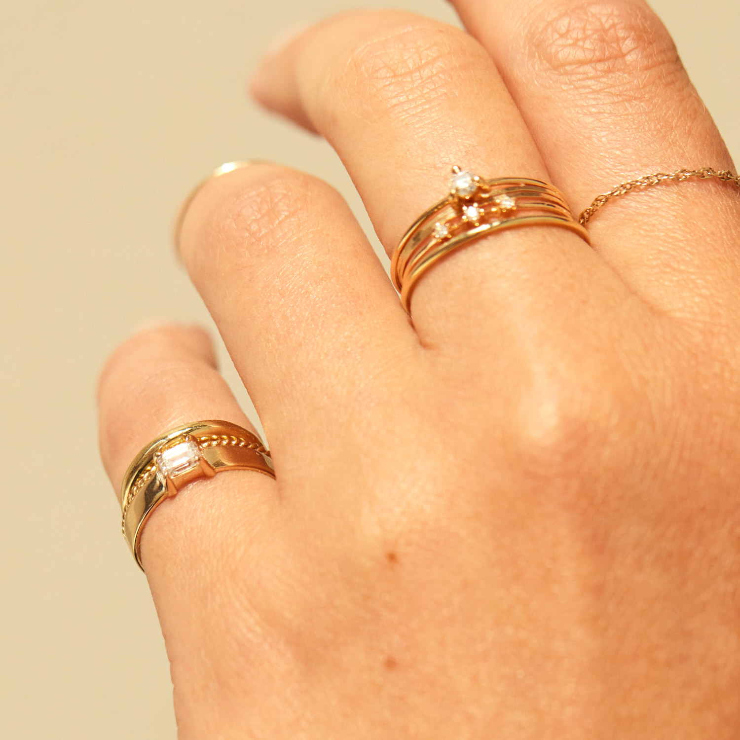 1150-emerald-cut-diamond-tomboy-ring–1.jpg