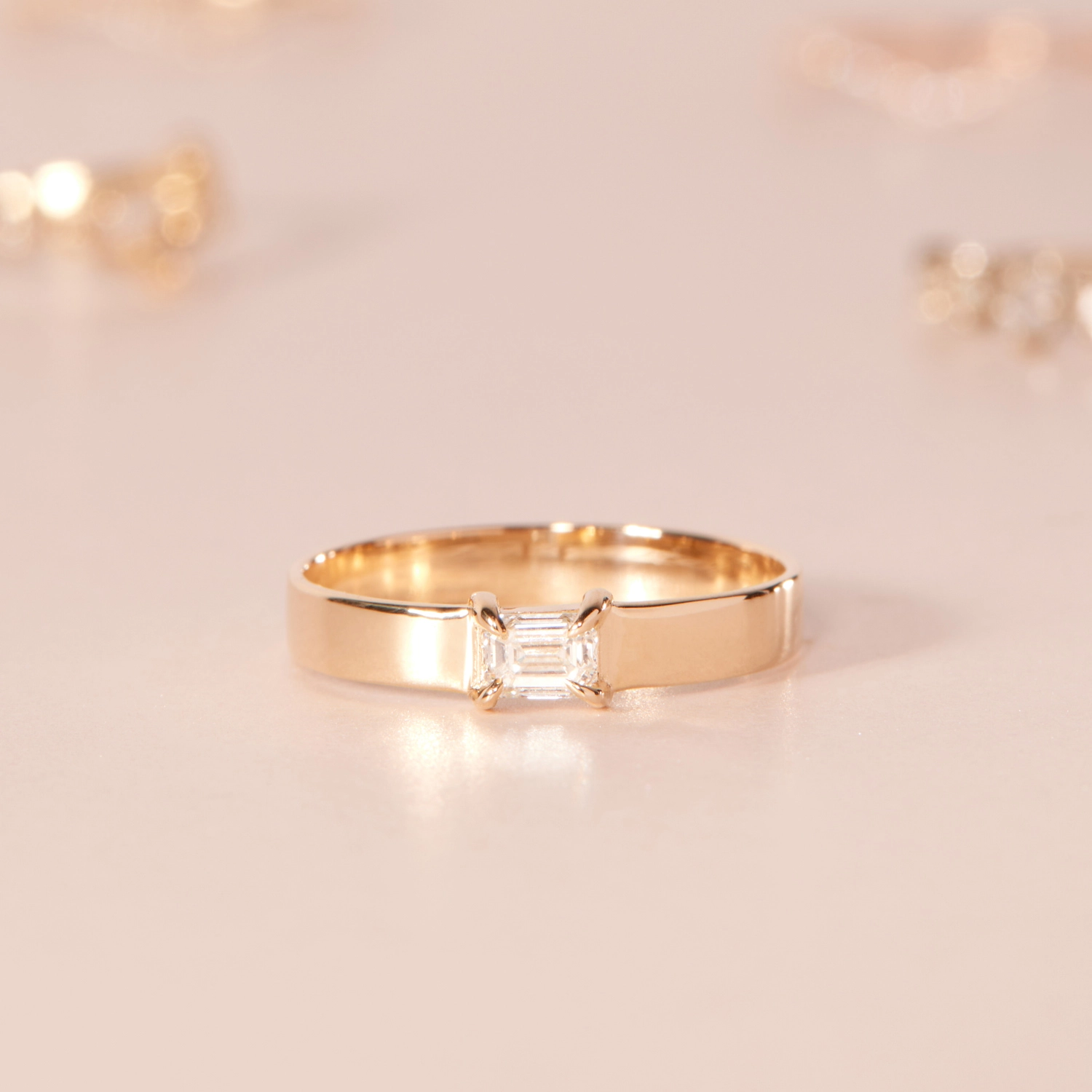 1150-emerald-cut-diamond-tomboy-ring–1.jpg
