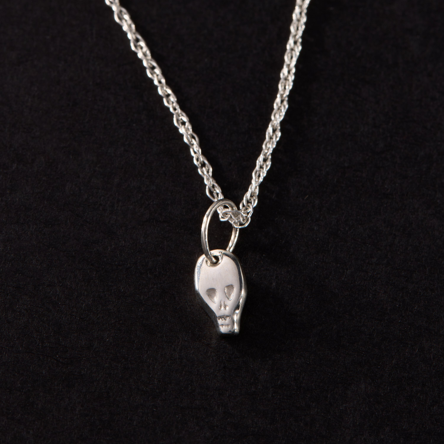 Micro Skull Silver Charm