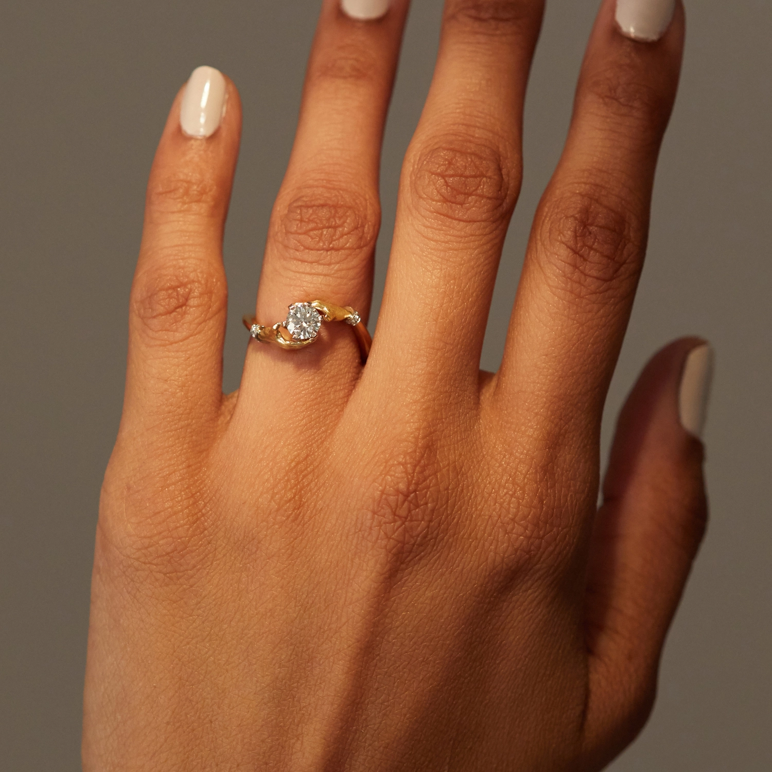 Cupping Hands Diamond Ring