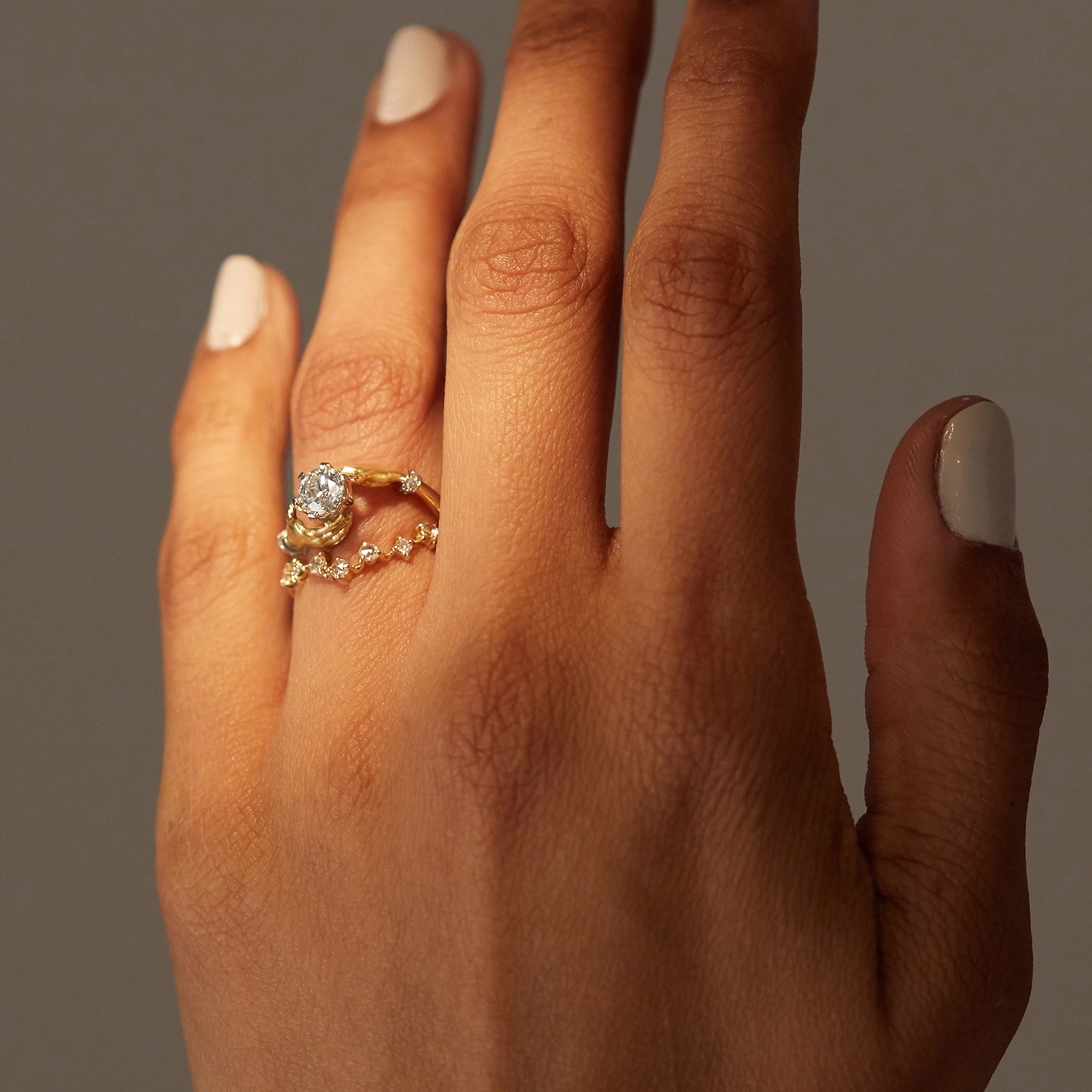 64-cupping-hands-diamond-ring–1.webp