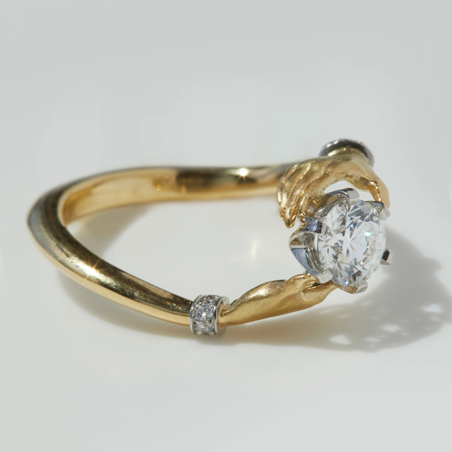 64-cupping-hands-diamond-ring–1.webp